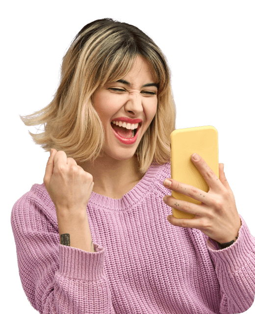 Woman holding phone and smiling